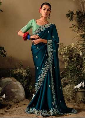 Astonishing Teal Embroidered Silk Contemporary Saree