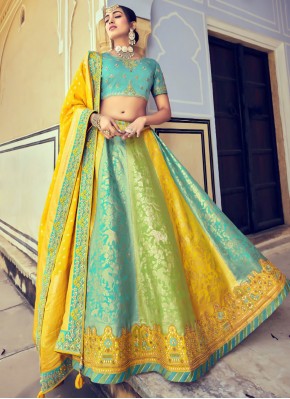 Bedazzling Silk Embroidered Blue and Yellow Lehenga Choli