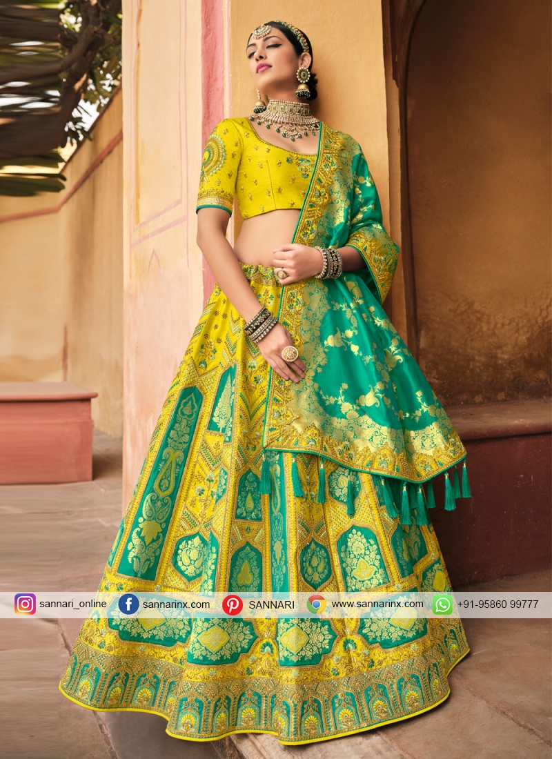 Buy Mani Bhatia Yellow Net Embroidered Lehenga Set Online | Aza Fashions