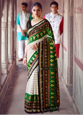 Tantalizing Fancy Green and Off White Patola Silk  Designer Saree