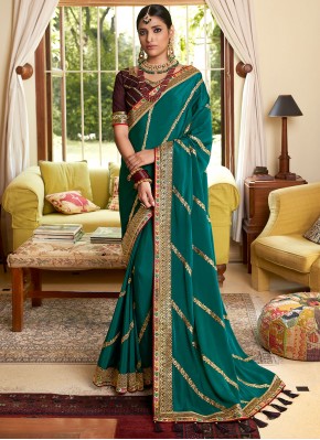Vibrant Patch Border Rama Crepe Silk Classic Designer Saree